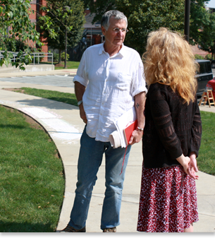 teacher talking with student